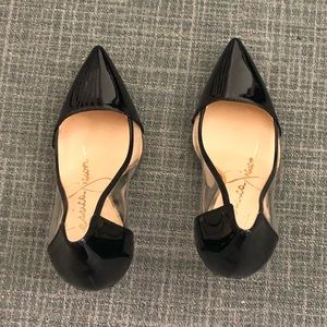 Jessica Simpson black and clear pumps.